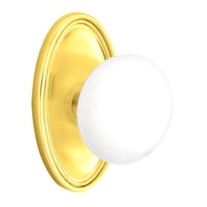 Privacy Ice White Porcelain Knob With Oval Rosette in Polished Brass