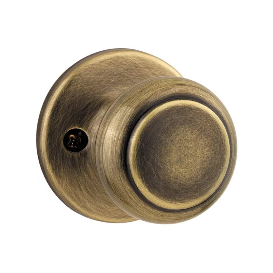 Cove Single Dummy Door Knob in Antique Brass