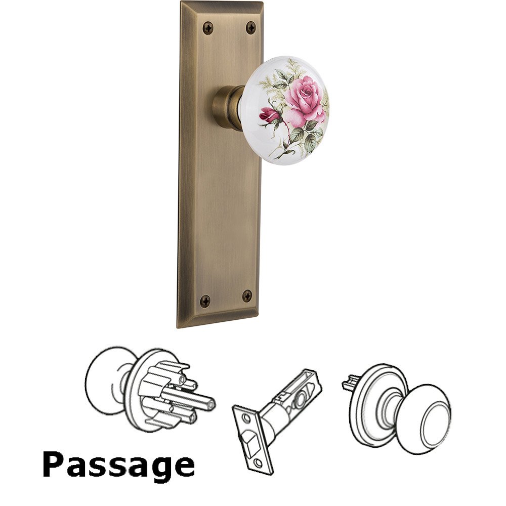 Passage New York Plate with White Rose Porcelain Door Knob in Antique Brass