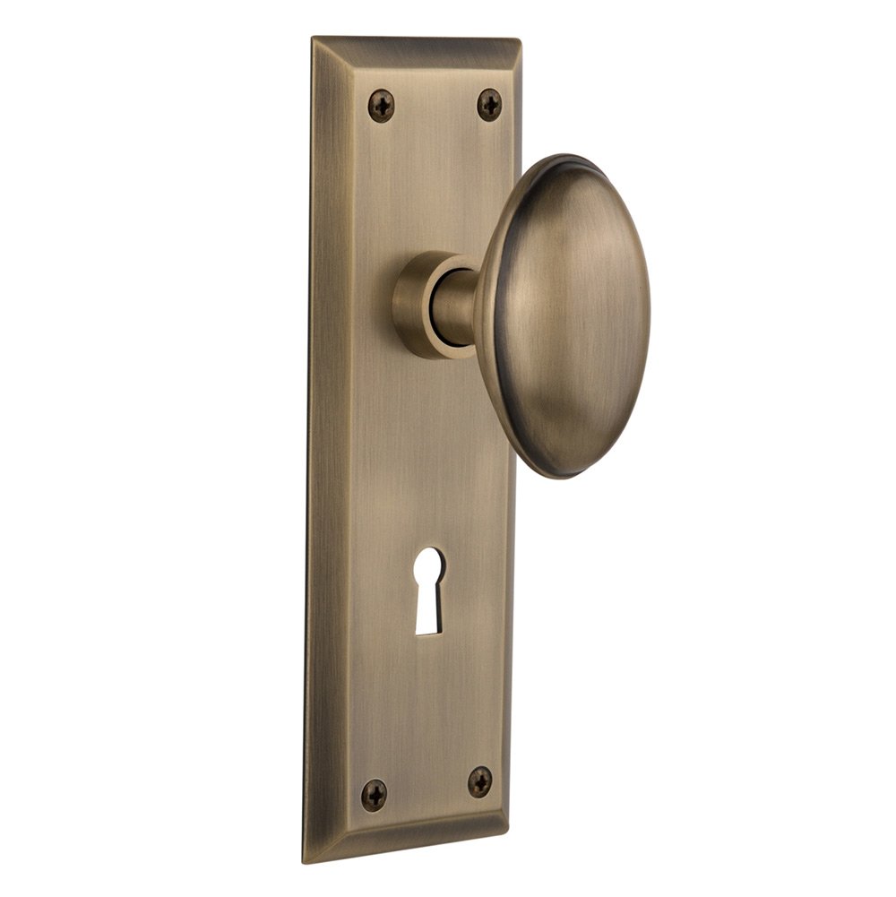 Privacy New York Plate with Keyhole and Homestead Door Knob in Antique Brass