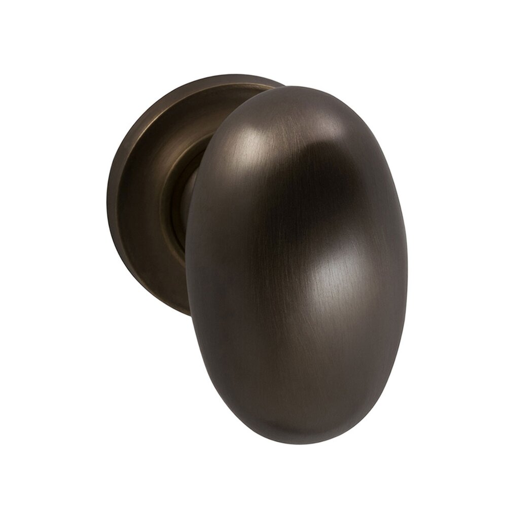 Single Dummy Traditions Classic Egg Door Knob with Small Radial Rosette in Antique Bronze Unlacquered