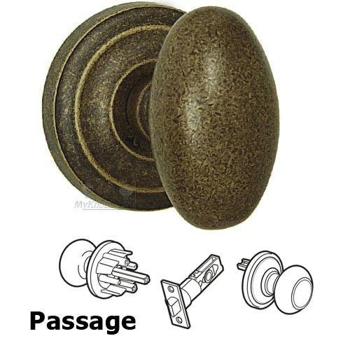 Passage Latchset Classic Egg Knob with Radial Rosette in Vintage Brass