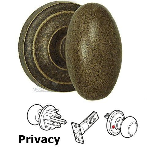Privacy Latchset Classic Egg Knob with Radial Rosette in Vintage Brass