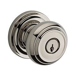 Keyed Traditional Door Knob with Traditional Round Rose in Polished Nickel