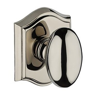 Privacy Ellipse Door Knob with Traditional Arch Rose in Polished Nickel