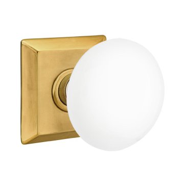 Privacy Ice White Porcelain Knob With Quincy Rosette in French Antique Brass