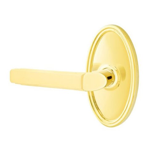 Single Dummy Left Handed Milano Door Lever With Oval Rose in Unlacquered Brass
