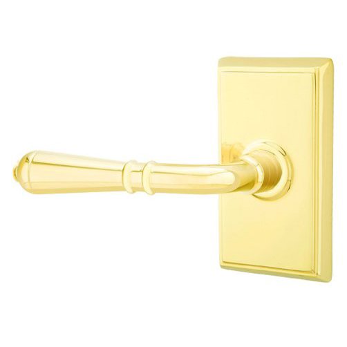 Single Dummy Left Handed Turino Door Lever With Rectangular Rose in Unlacquered Brass