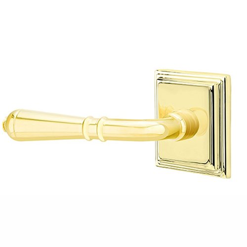 Double Dummy Left Handed Turino Door Lever With Wilshire Rose in Unlacquered Brass