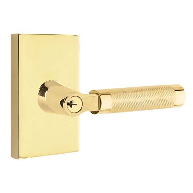 Key In L-Square Knurled Right Handed Lever with Modern Rectangular Rosette in Unlacquered Brass
