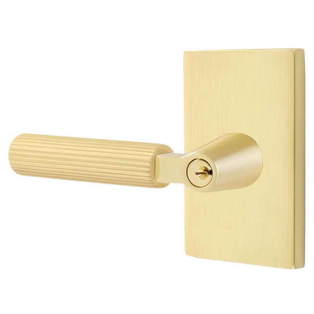 Key In L-Square Straight Knurled Left Handed Lever with Modern Rectangular Rosette in Satin Brass