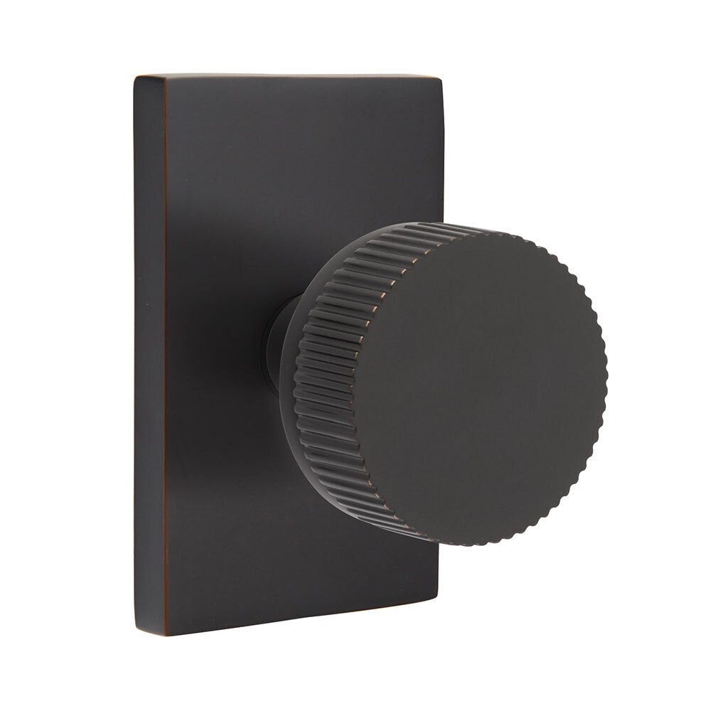 Privacy Modern Rectangular Rosette with Concealed Screws Conical Stem and Straight Knurled Knob in Oil Rubbed Bronze