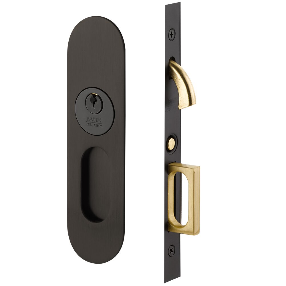 Narrow Modern Oval Keyed Pocket Door Mortise Lock in Oil Rubbed Bronze