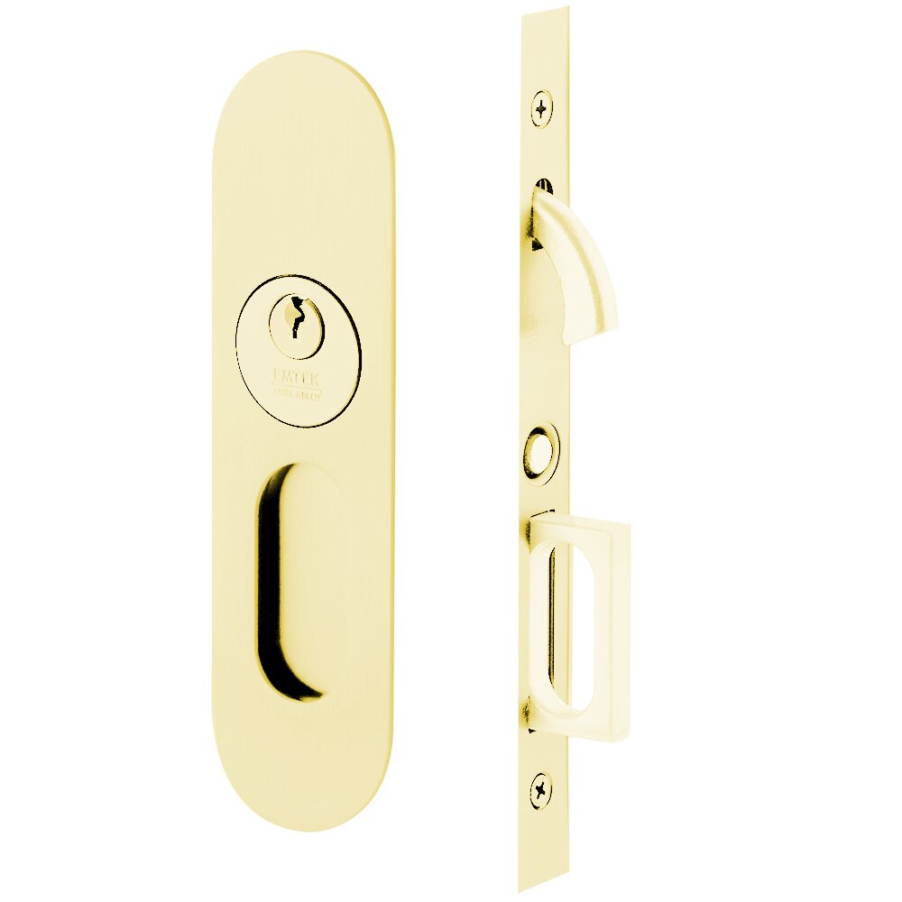 Narrow Modern Oval Keyed Pocket Door Mortise Lock in Unlacquered Brass