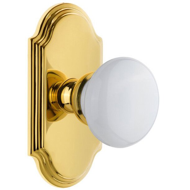 Arc Plate Passage with Hyde Park White Porcelain Knob in Polished Brass