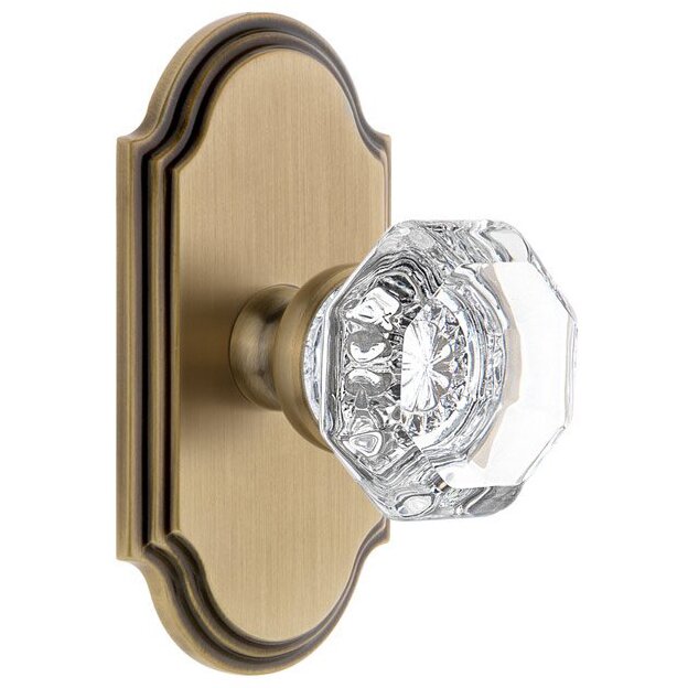 Grandeur Arc Plate Passage with Chambord Crystal Knob in Vintage Brass