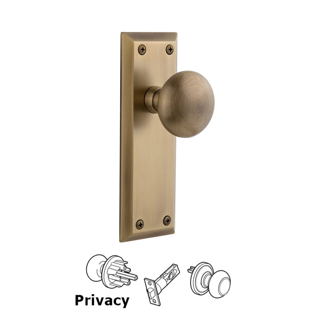 Grandeur Fifth Avenue Plate Privacy with Fifth Avenue Knob in Vintage Brass
