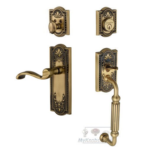 Parthenon with "F" Grip and Portofino Left Handed Door Lever in Vintage Brass