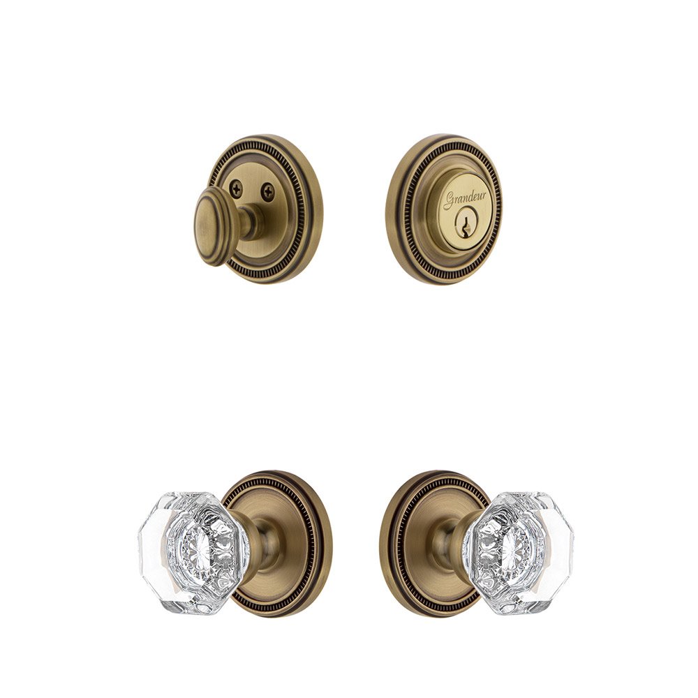 Soleil Rosette With Chambord Crystal Knob & Matching Deadbolt In Vintage Brass