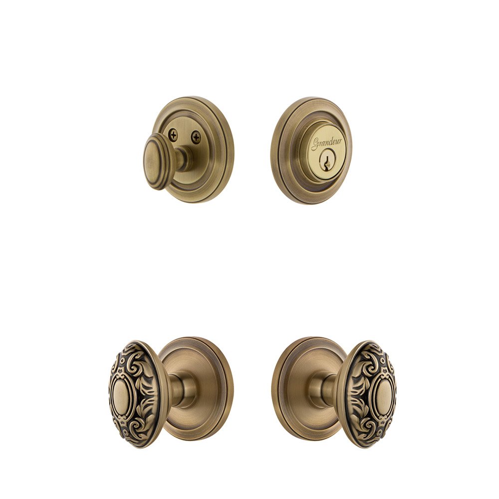 Circulaire Rosette With Grande Victorian Knob & Matching Deadbolt In Vintage Brass