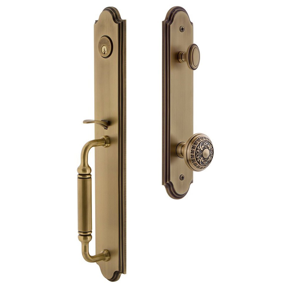 Arc One-Piece Handleset with C Grip and Windsor Knob in Vintage Brass