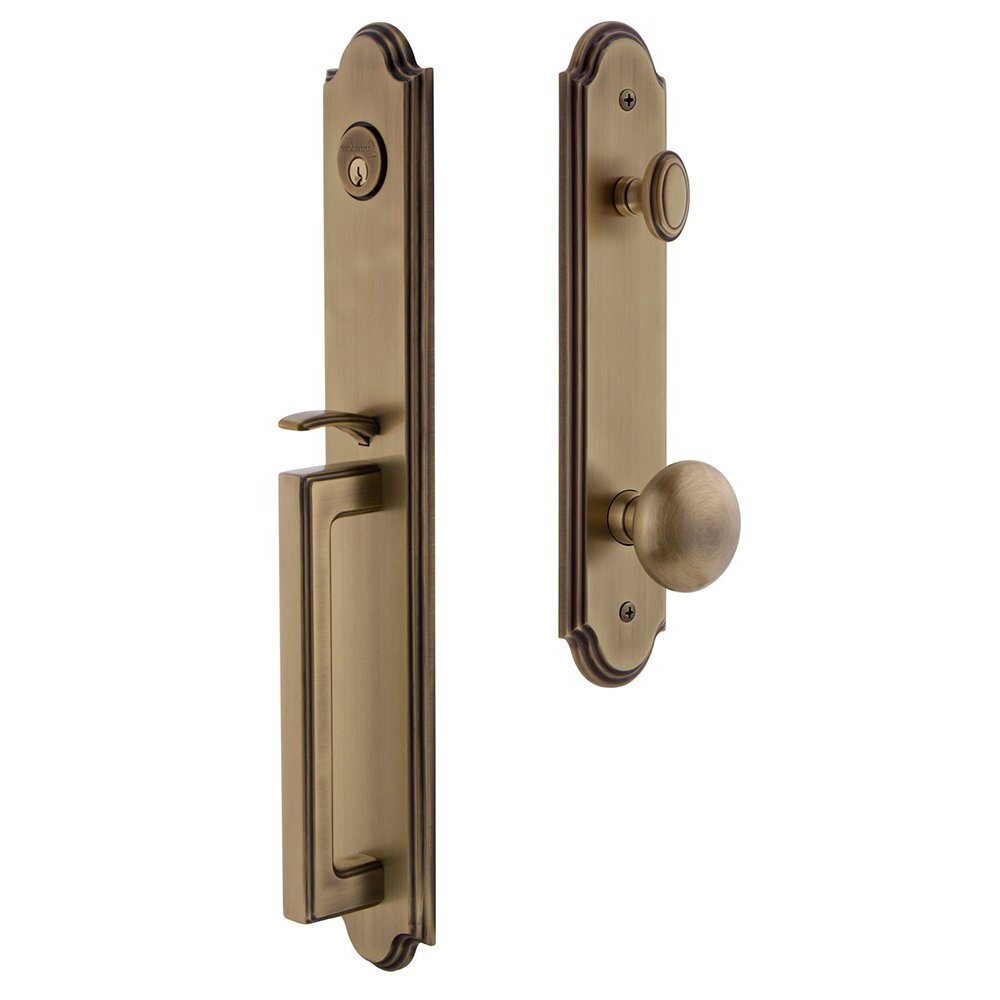 Arc One-Piece Handleset with D Grip and Fifth Avenue Knob in Vintage Brass