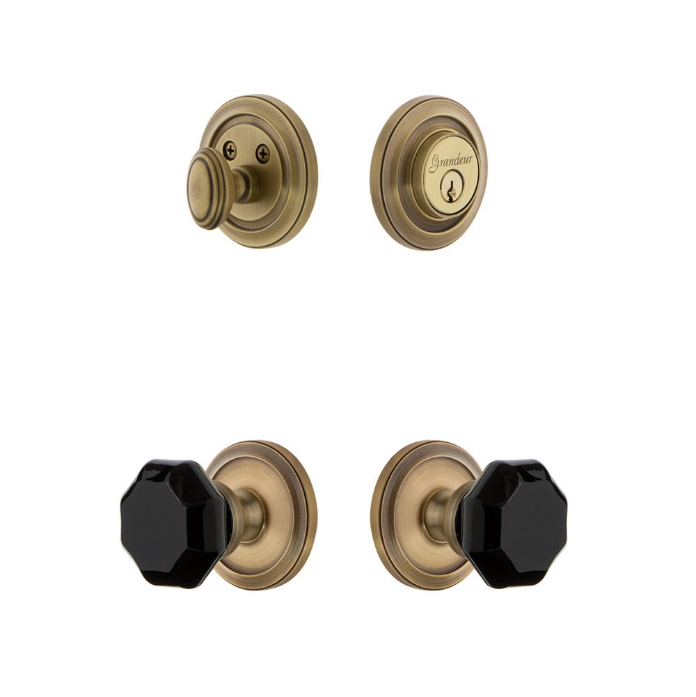 Circulaire Rosette with Lyon Knob and matching Deadbolt in Vintage Brass