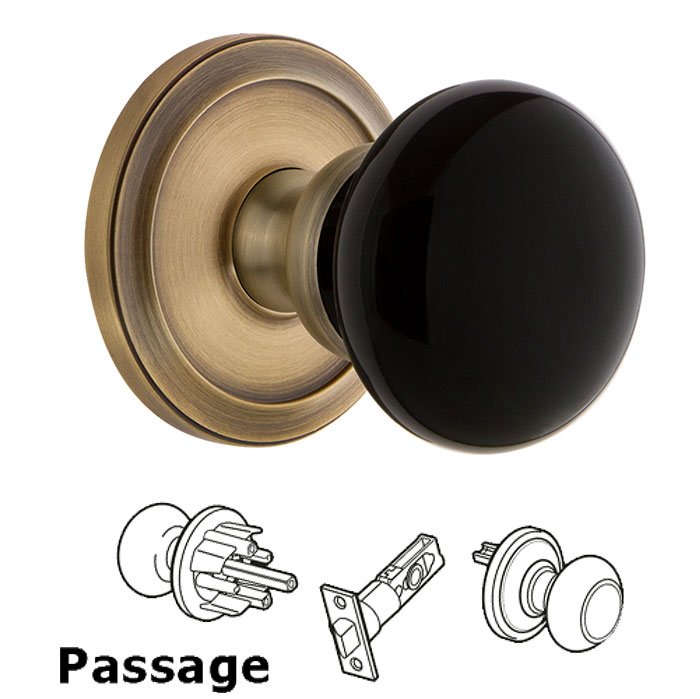 Passage - Circulaire Rosette with Black Coventry Porcelain Knob in Vintage Brass