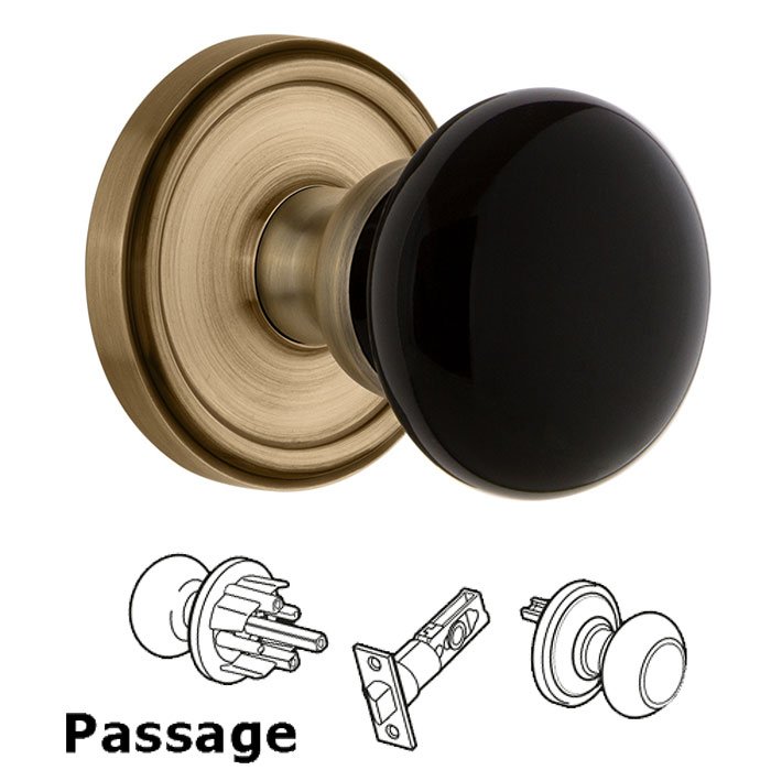 Passage - Georgetown Rosette with Black Coventry Porcelain Knob in Vintage Brass