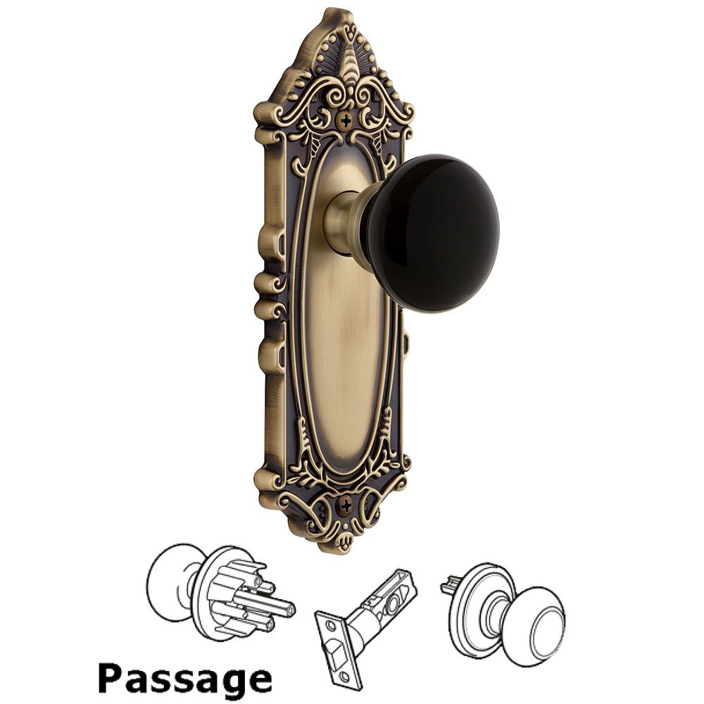 Passage - Grande Victorian Rosette with Black Coventry Porcelain Knob in Vintage Brass