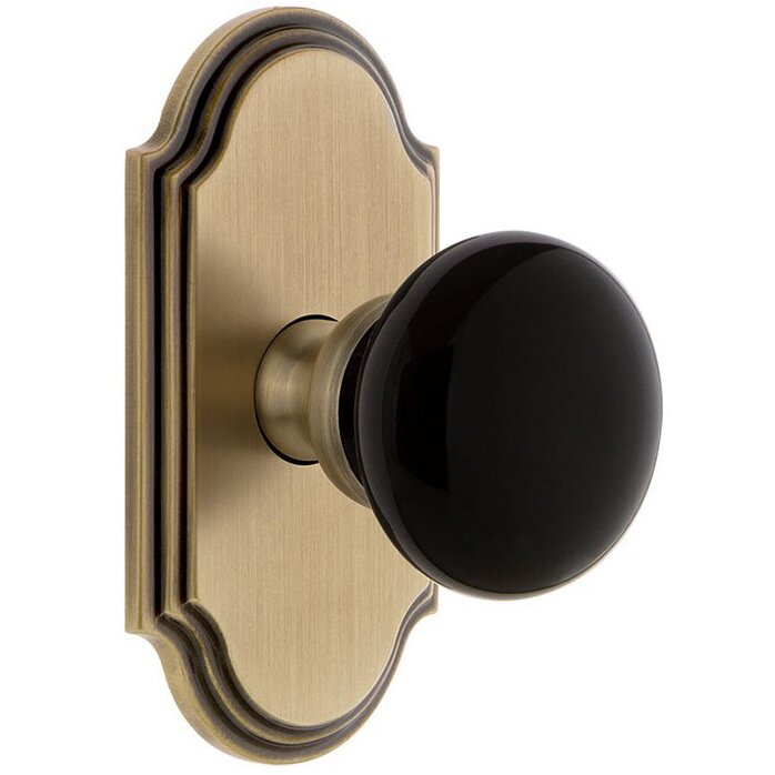 Privacy - Arc Rosette with Black Coventry Porcelain Knob in Vintage Brass