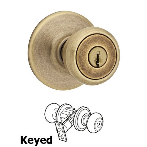 Tylo Keyed Entry Door Knob in Antique Brass