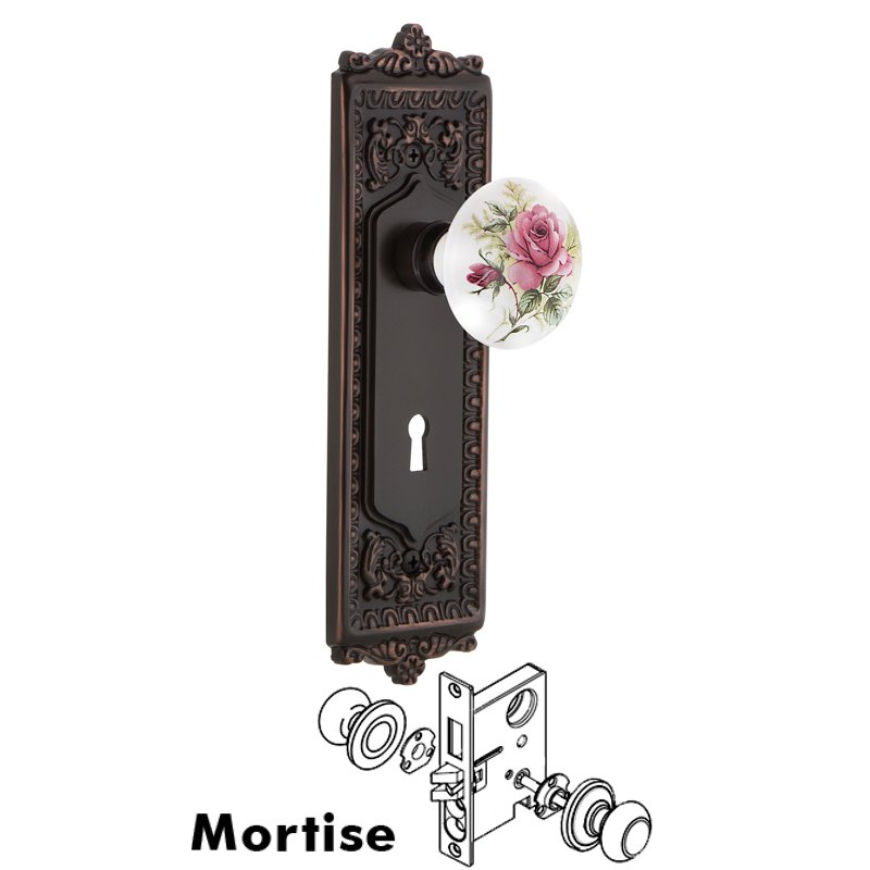 Complete Mortise Lockset with Keyhole - Egg & Dart Plate with White Rose Porcelain Door Knob in Timeless Bronze