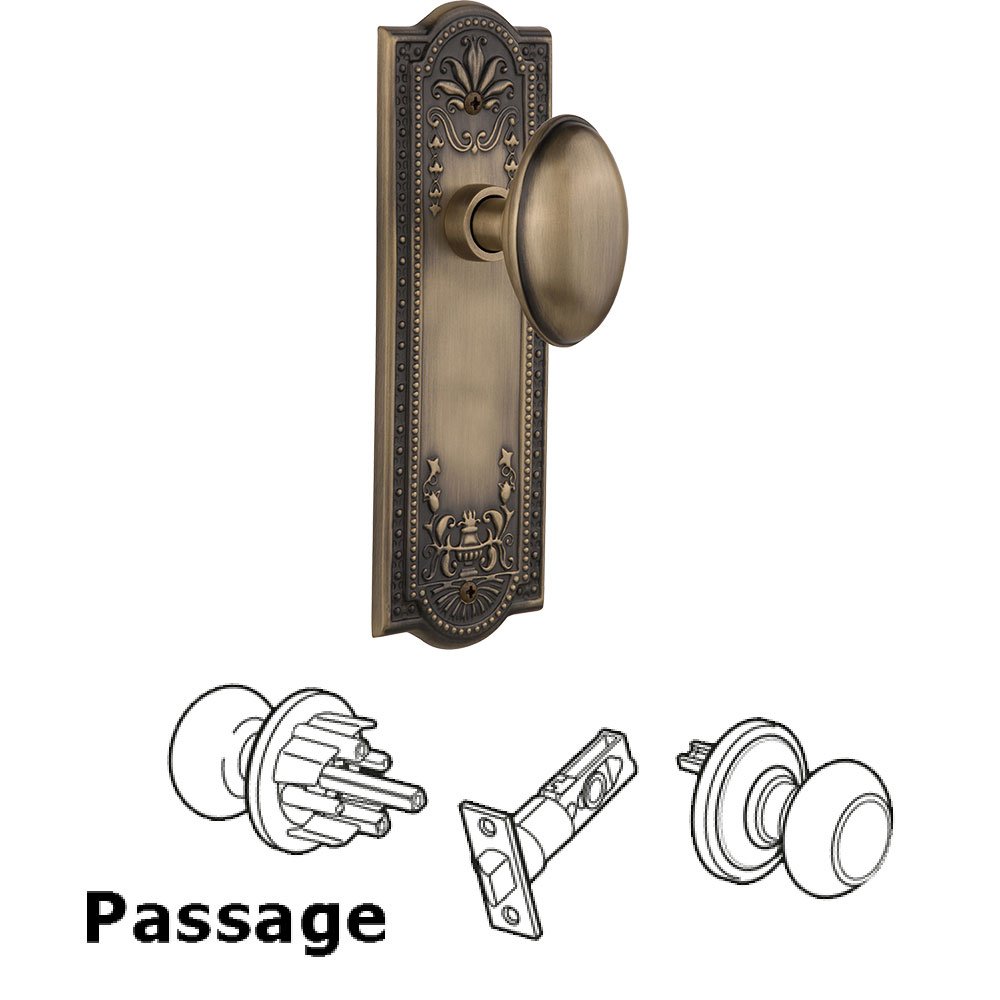 Passage Meadows Plate with Homestead Door Knob in Antique Brass