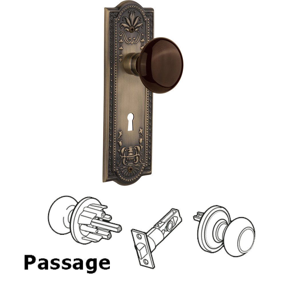 Passage Meadows Plate with Keyhole and Brown Porcelain Door Knob in Antique Brass