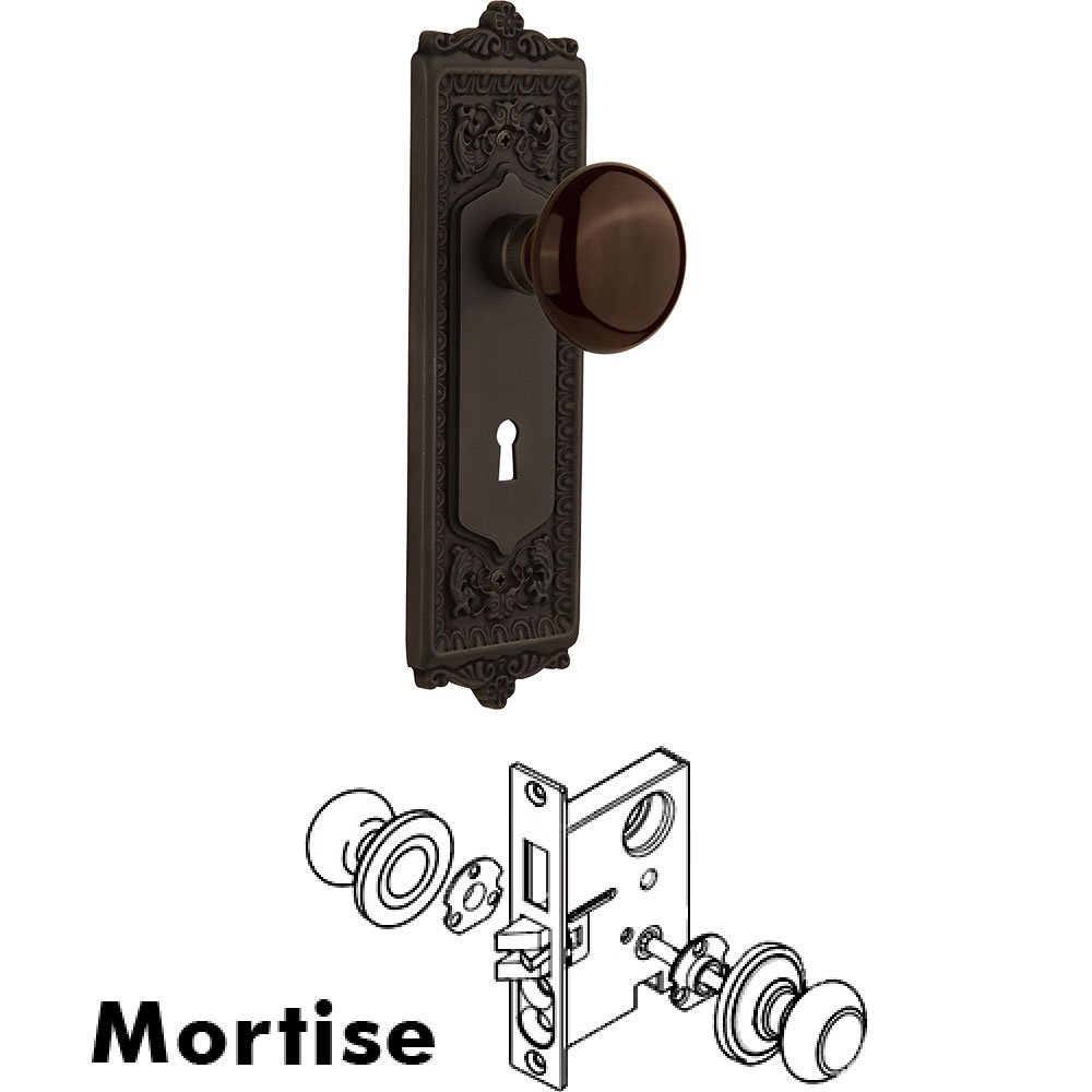 Mortise - Egg and Dart Plate with Brown Porcelain Knob with Keyhole in Oil Rubbed Bronze