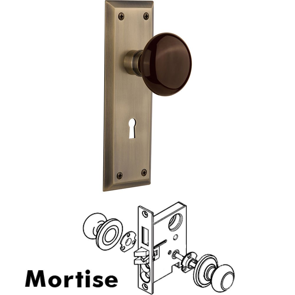 Mortise - New York Plate with Brown Porcelain Knob with Keyhole in Antique Brass