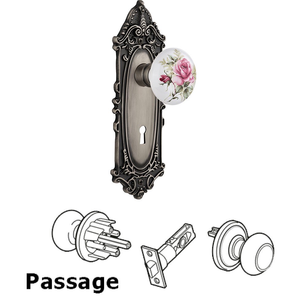 Passage Victorian Plate with Keyhole and White Rose Porcelain Door Knob in Antique Pewter