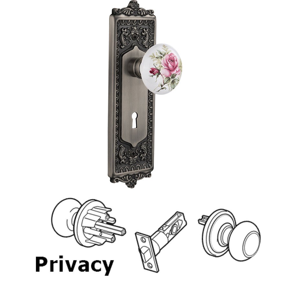 Privacy Egg & Dart Plate with Keyhole and White Rose Porcelain Door Knob in Antique Pewter