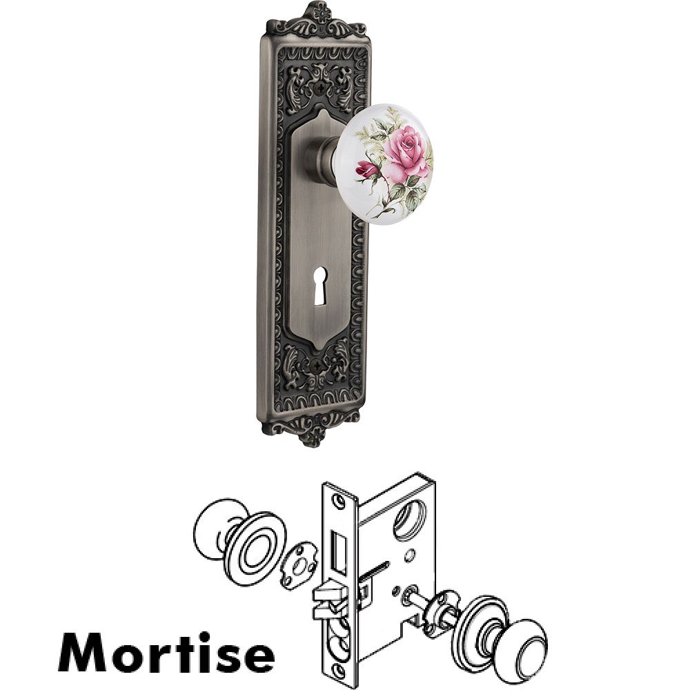Mortise - Egg and Dart Plate with Rose Porcelain Knob with Keyhole in Antique Pewter
