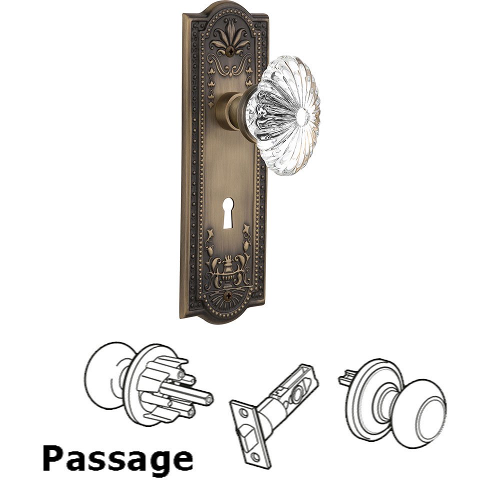 Passage Meadows Plate with Keyhole and Oval Fluted Crystal Glass Door Knob in Antique Brass
