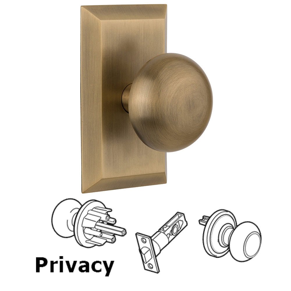 Privacy Studio Plate with New York Knob in Antique Brass