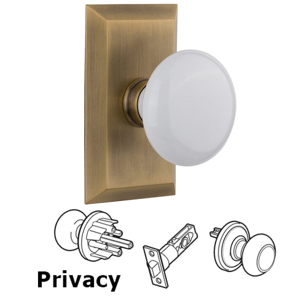 Privacy Studio Plate with White Porcelain Knob in Antique Brass