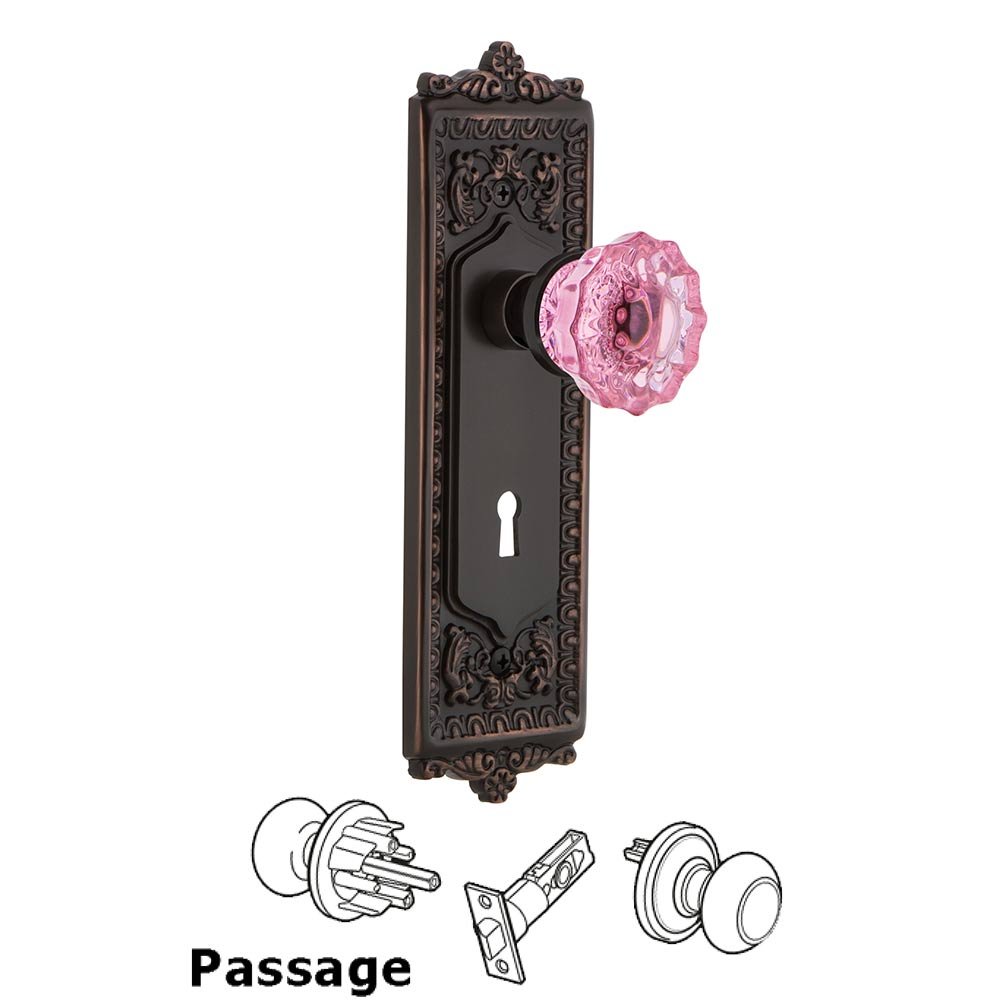 Nostalgic Warehouse - Passage - Egg & Dart Plate with Keyhole Crystal Pink Glass Door Knob in Timeless Bronze