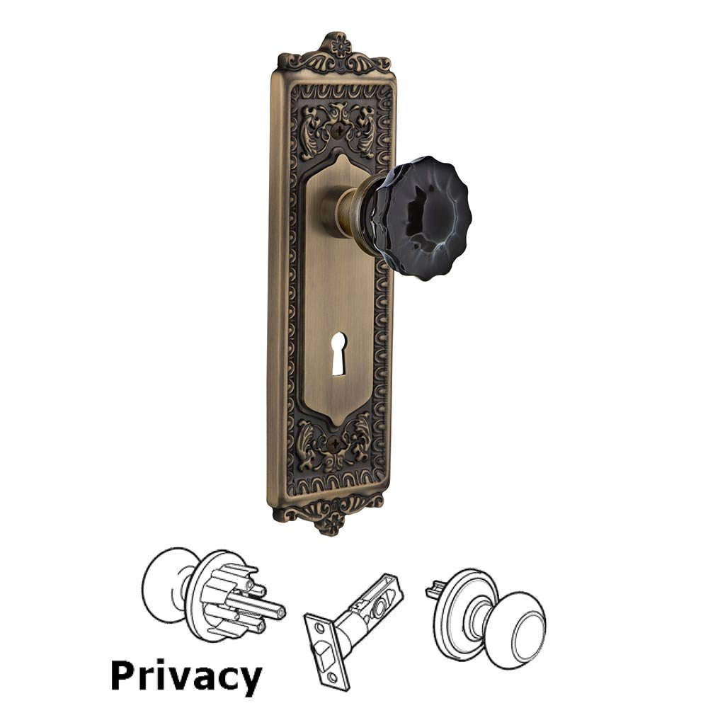Nostalgic Warehouse - Privacy - Egg & Dart Plate with Keyhole Crystal Black Glass Door Knob in Antique Brass