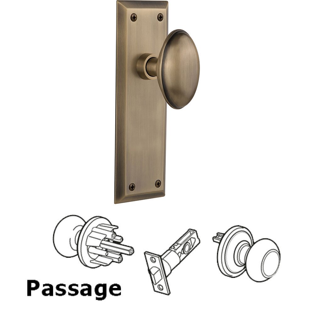 Passage Knob - New York Plate with Homestead Door Knob in Antique Brass