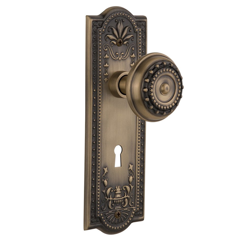 Privacy Meadows Plate with Keyhole and Meadows Door Knob in Antique Brass