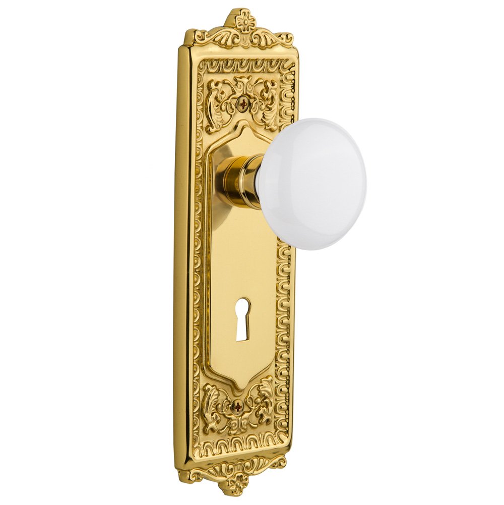 Privacy Egg & Dart Plate with Keyhole and White Porcelain Door Knob in Polished Brass