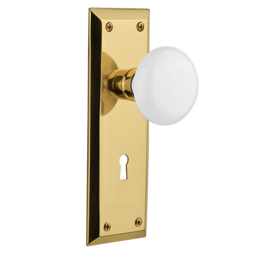 Single Dummy New York Plate with Keyhole and White Porcelain Door Knob in Polished Brass