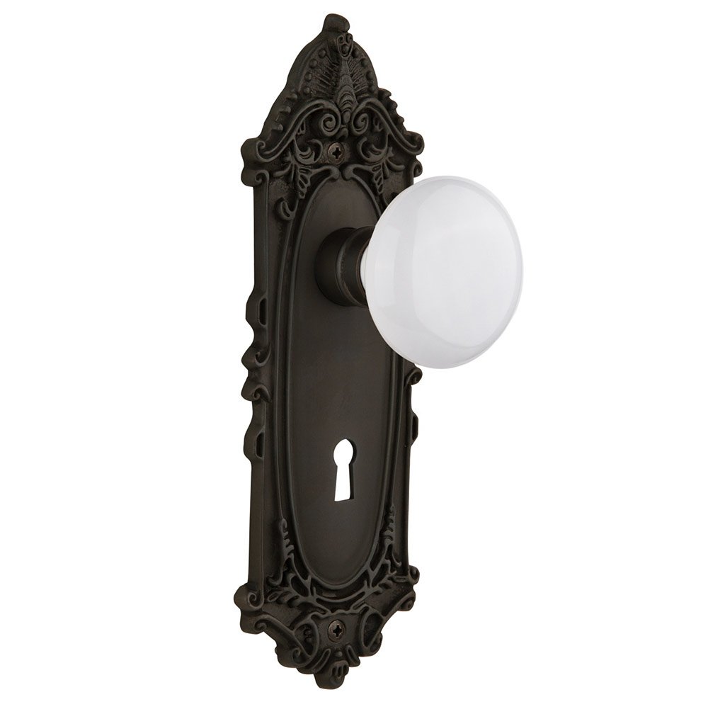 Passage Victorian Plate with Keyhole and White Porcelain Door Knob in Oil-Rubbed Bronze